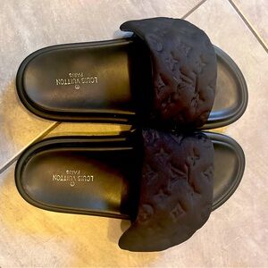 Size 9.5-10 Black flip flops - LV letter imprint